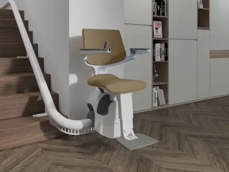 A stair lift is installed along a staircase in a modern home.